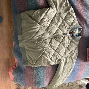 Lightly used Eddie Bauer tan bomb jacket. PLEASE NOTE- damage to right sleeve